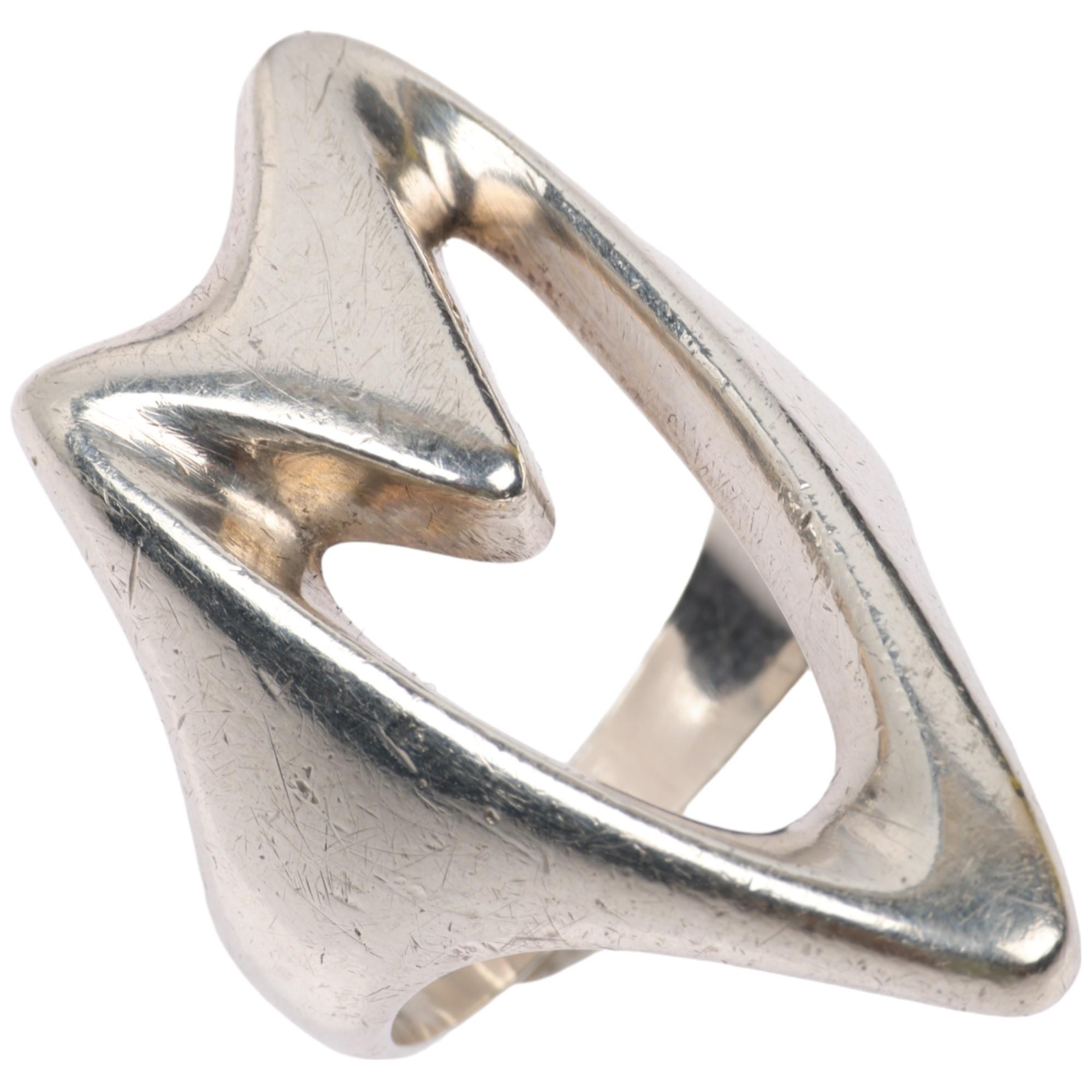 GEORG JENSEN - a Danish modernist sterling silver abstract openwork ring, designed by Henning