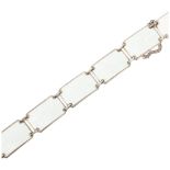 A Danish modernist sterling silver and white enamel panel bracelet, 18cm, 22g Condition Report: No