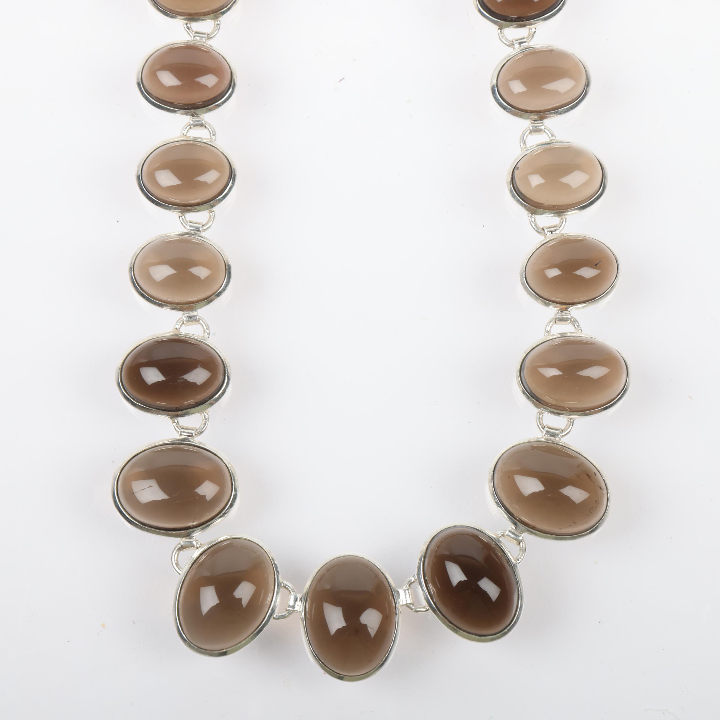 An impressive modern sterling silver graduated smoky quartz fringe necklace, set with oval - Image 2 of 3