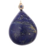 A large Vintage lapis lazuli sapphire and diamond flowerhead cluster pendant, set with pear cabochon