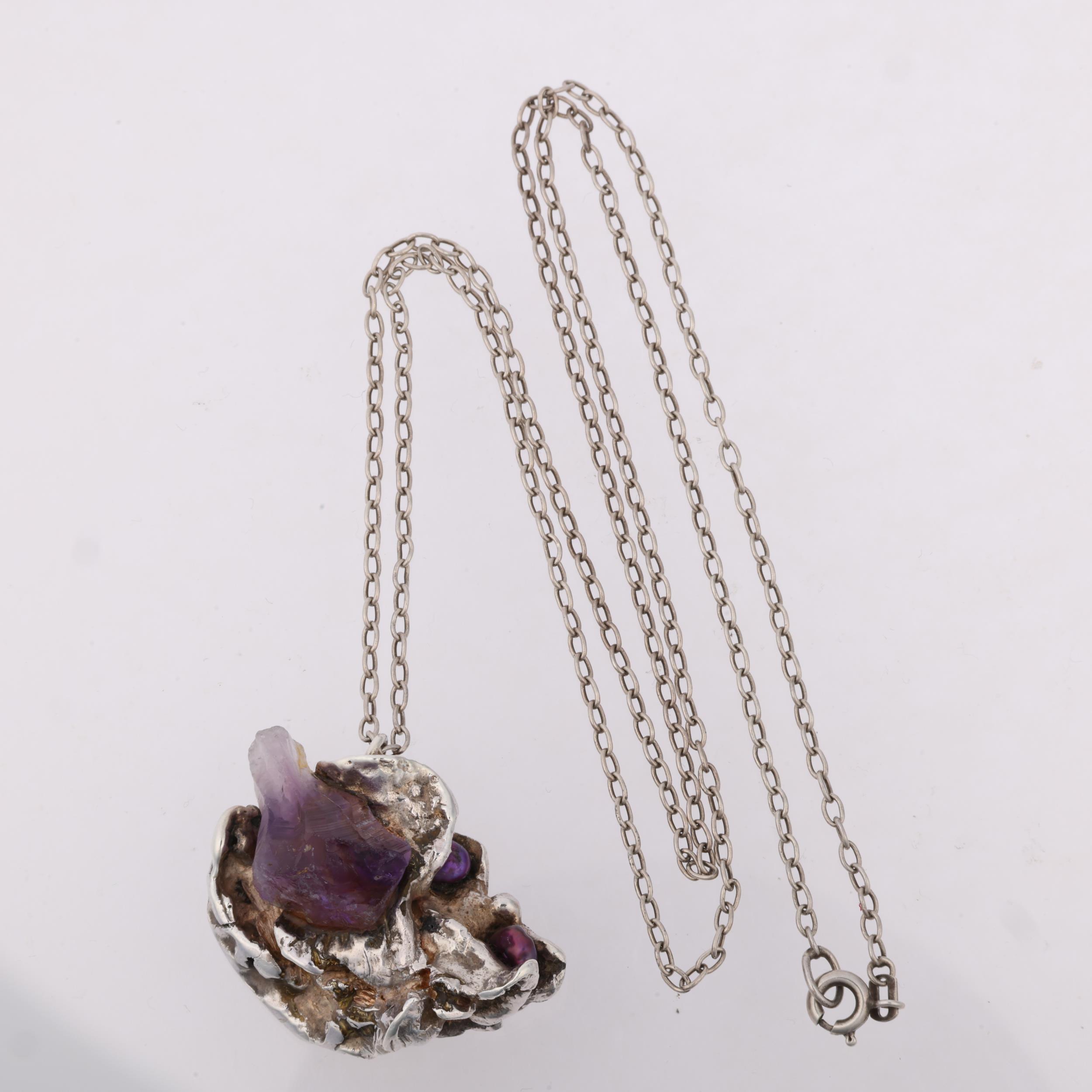 A Danish brutalist amethyst crystal and pearl abstract pendant necklace, apparently unmarked, on - Image 2 of 3