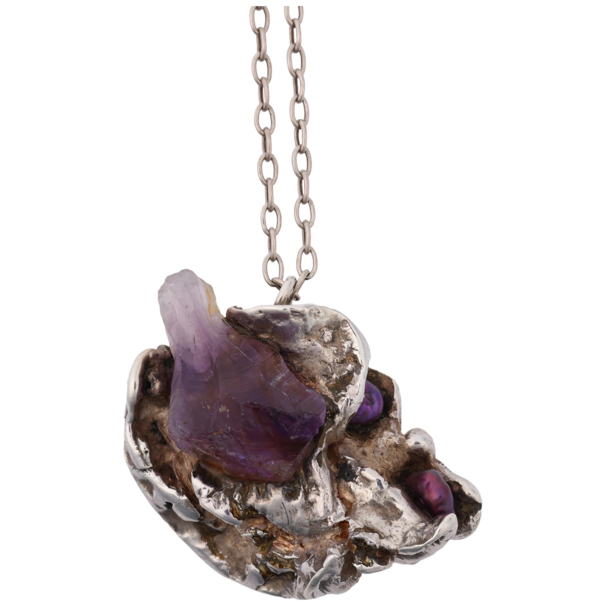 A Danish brutalist amethyst crystal and pearl abstract pendant necklace, apparently unmarked, on