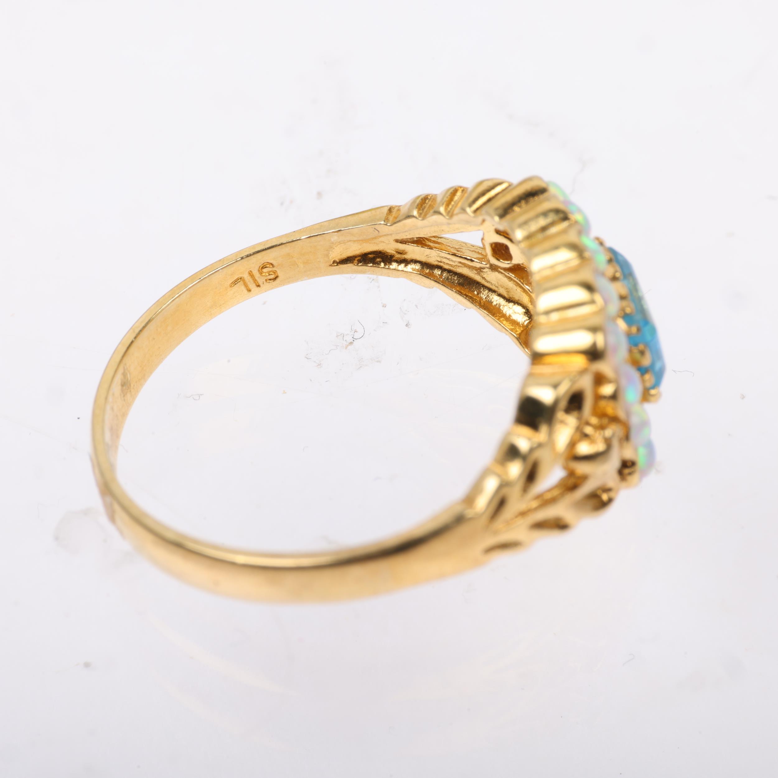 A modern silver-gilt blue topaz and synthetic opal cluster ring, in the Georgian style, setting - Image 3 of 3