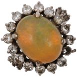 A 14ct white gold Ethiopian opal and diamond oval cluster ring, claw set with oval cabochon opal and