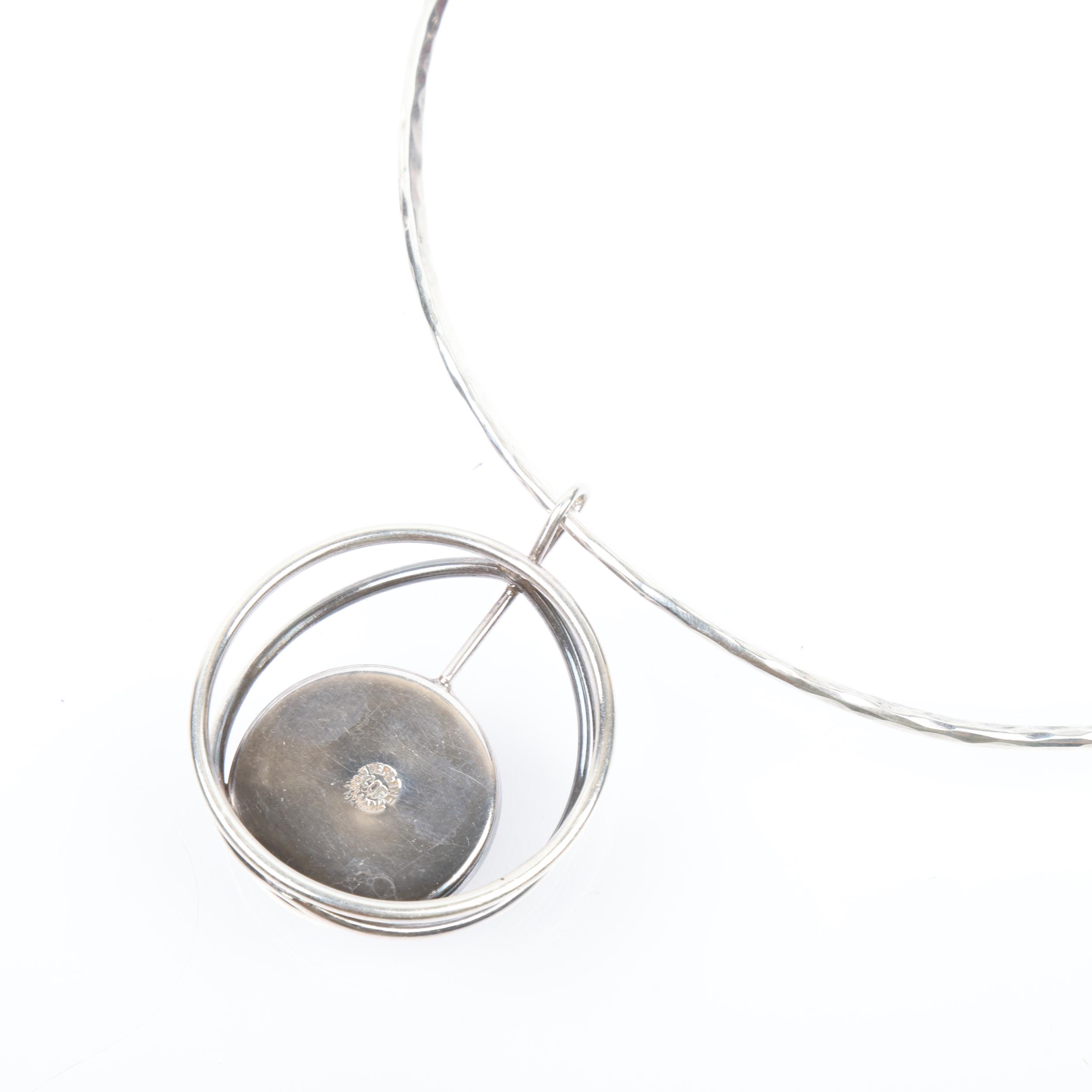 CARL OVE FRYDENSBERG - a a Danish modernist sterling silver amber openwork pendant necklace, on - Image 3 of 3