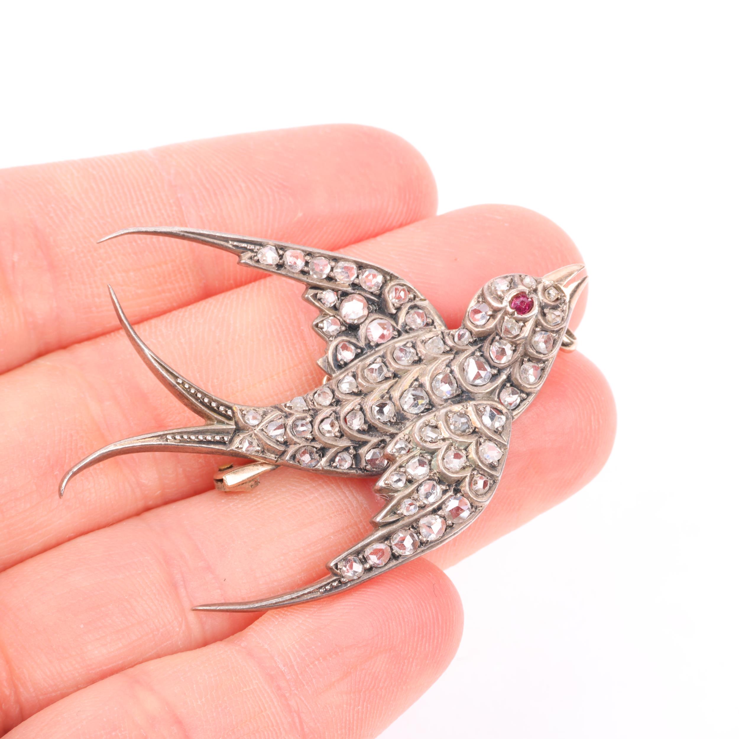 A 19th century ruby and diamond figural swallow bird brooch, circa 1890, set with rose-cut diamonds, - Image 4 of 4