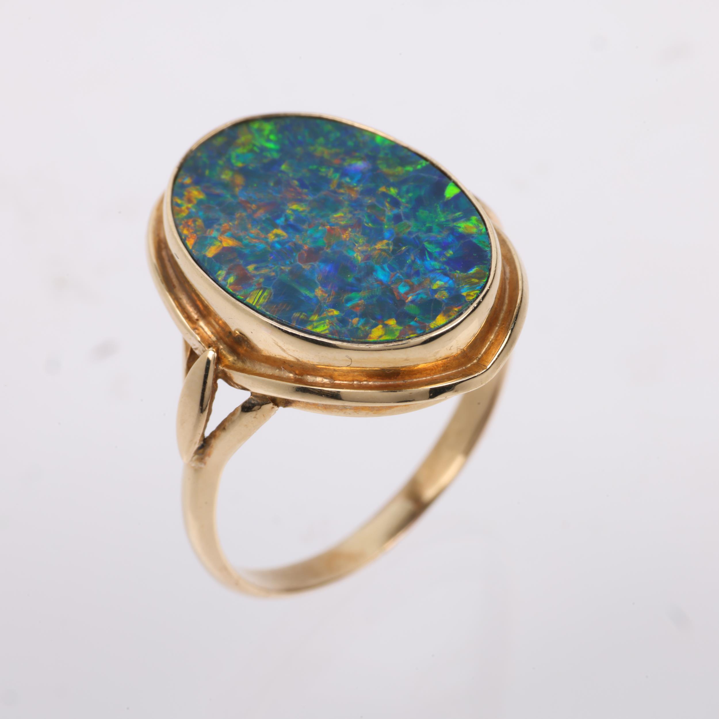 A late 20th century black opal doublet dress ring, apparently unmarked Continental gold settings, - Image 2 of 4