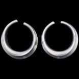 PALLE BISGAARD - a pair of Danish modernist sterling silver ear cuffs, plain circular concave