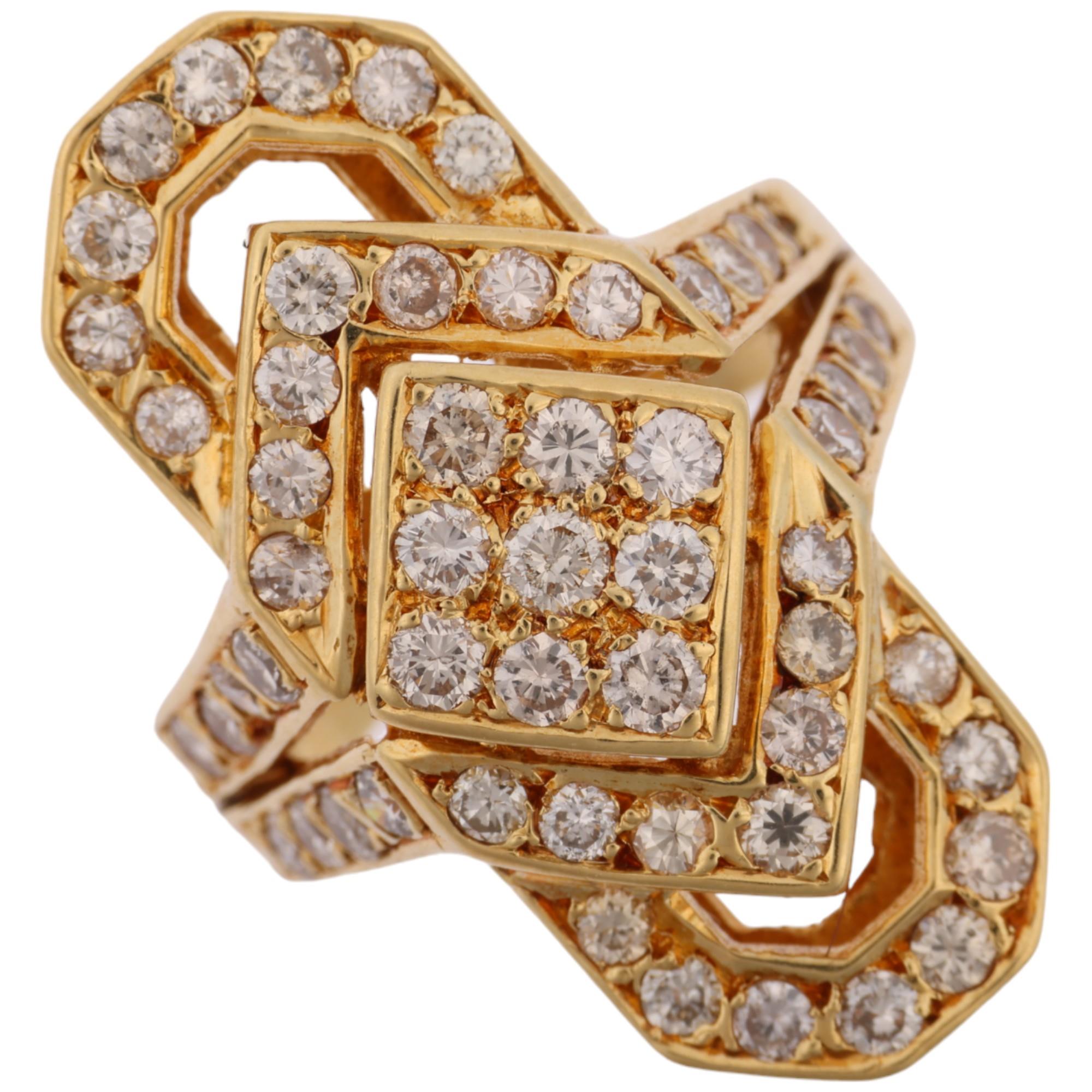 An 18ct gold diamond geometric openwork panel ring, set with modern round brilliant-cut diamonds,