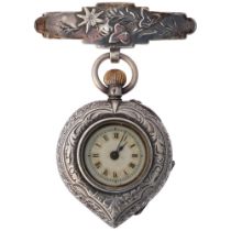 A Swiss silver heart open-face keyless fob watch, cream enamel dial with Roman numeral hour markers,