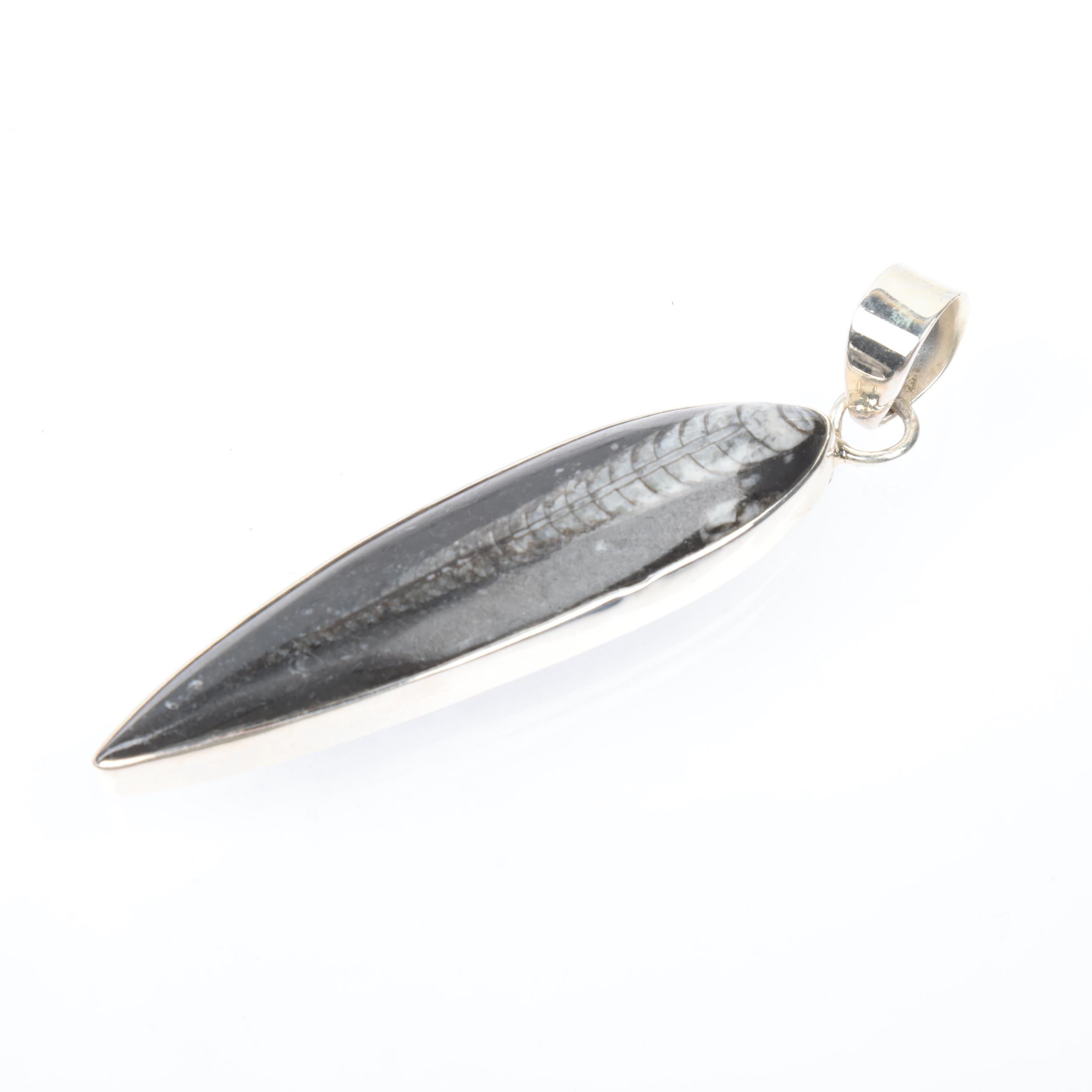 A large sterling silver orthoceras fossil drop pendant, London 2006, 94.4mm, 22.9g Condition Report: - Image 2 of 3