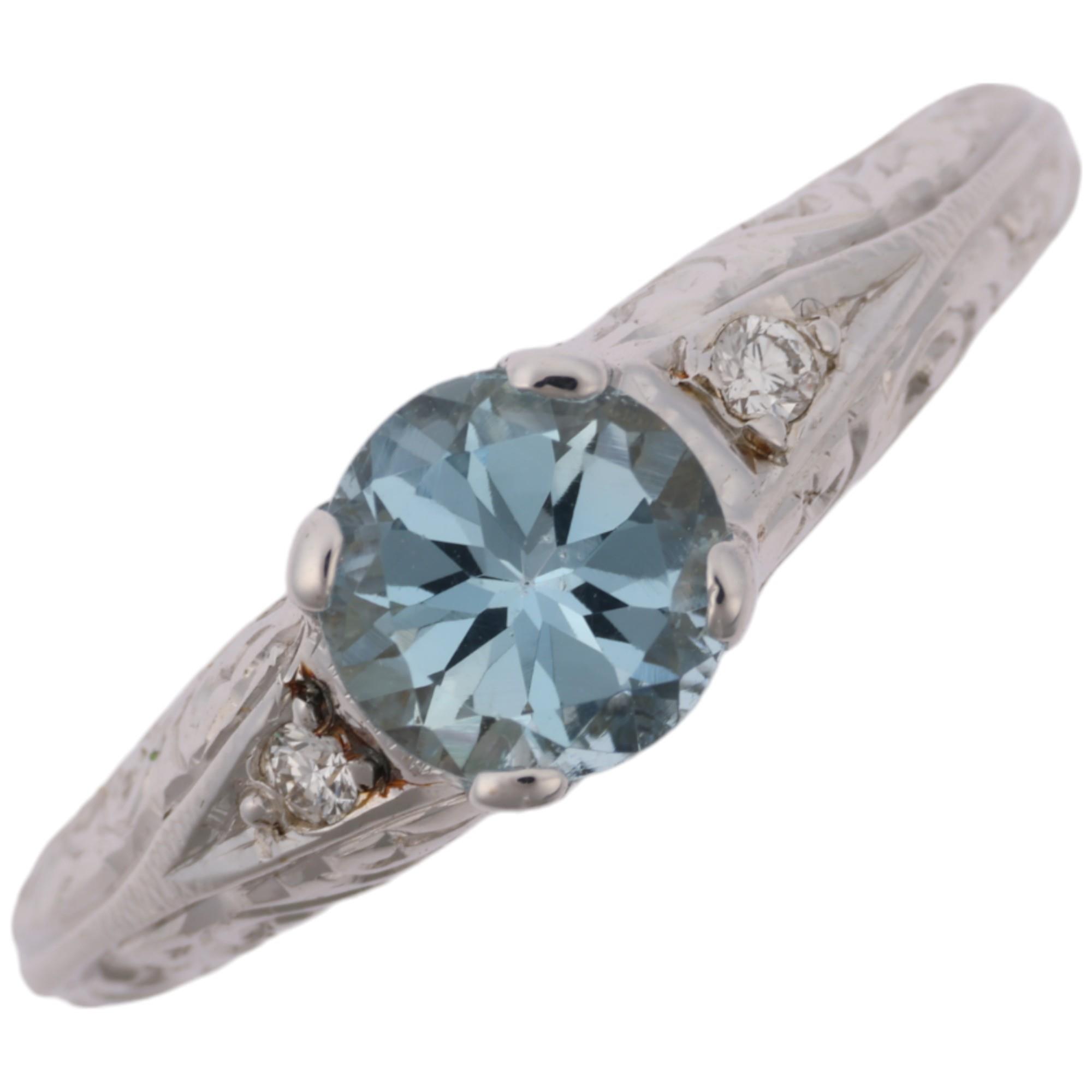 A modern 18ct white gold aquamarine and diamond dress ring, in Art Deco style, claw set with 0.7ct