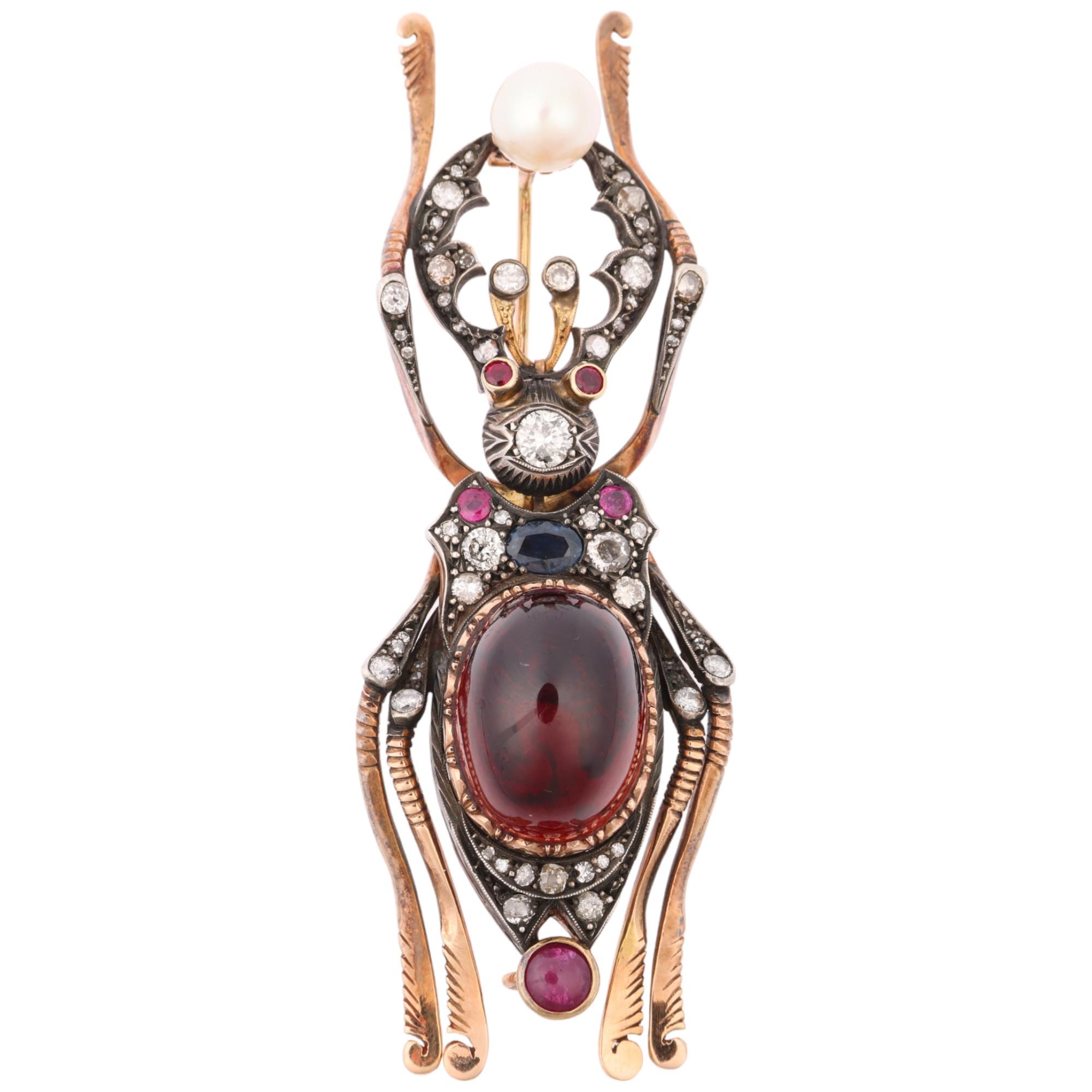 A large Russian 56 zolotnik (14k gold) and silver gem set figural beetle brooch, with Workmaster