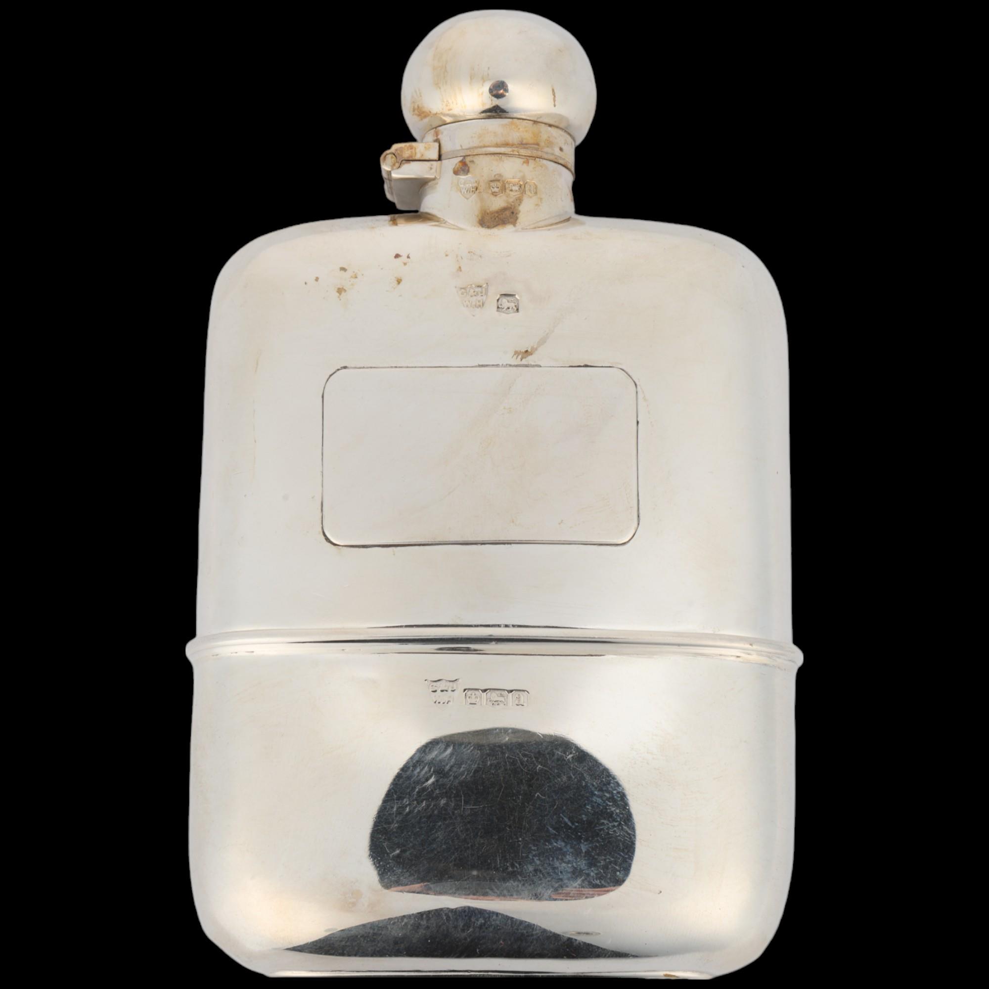 A good quality George V curved silver spirit flask, G&J Hawksley, Sheffield 1918, rectangular form