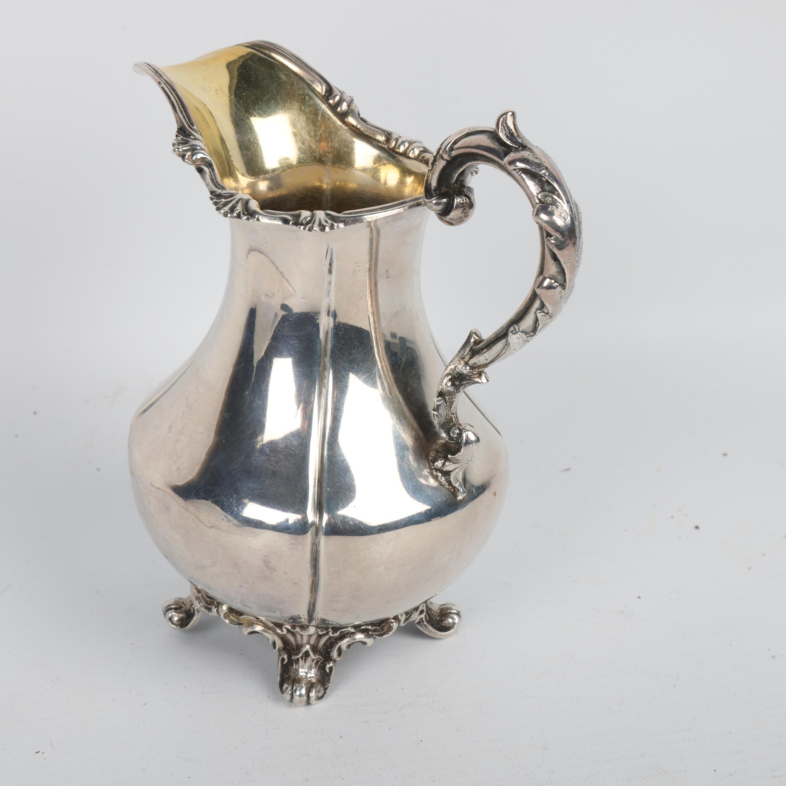 An early Victorian silver pumpkin cream jug, Richard Devonshire, London 1848, baluster form with - Image 2 of 3