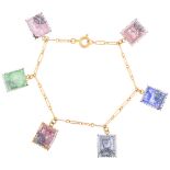 An Art Deco enamel postage stamp charm bracelet, each charm depicting 1930s European postage stamps,