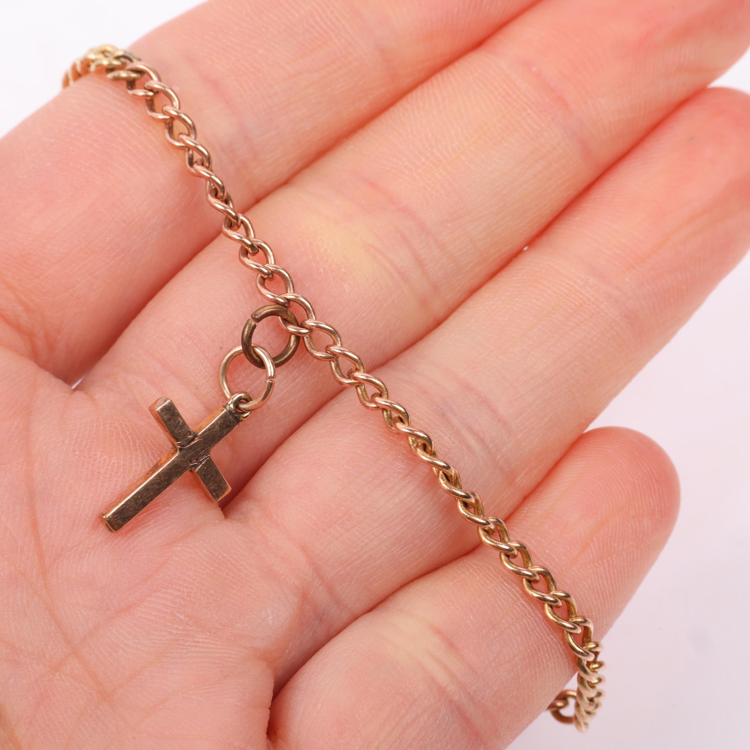 An early 20th century 9ct gold curb link chain bracelet, with unmarked gold cross charm and 9ct - Image 4 of 4