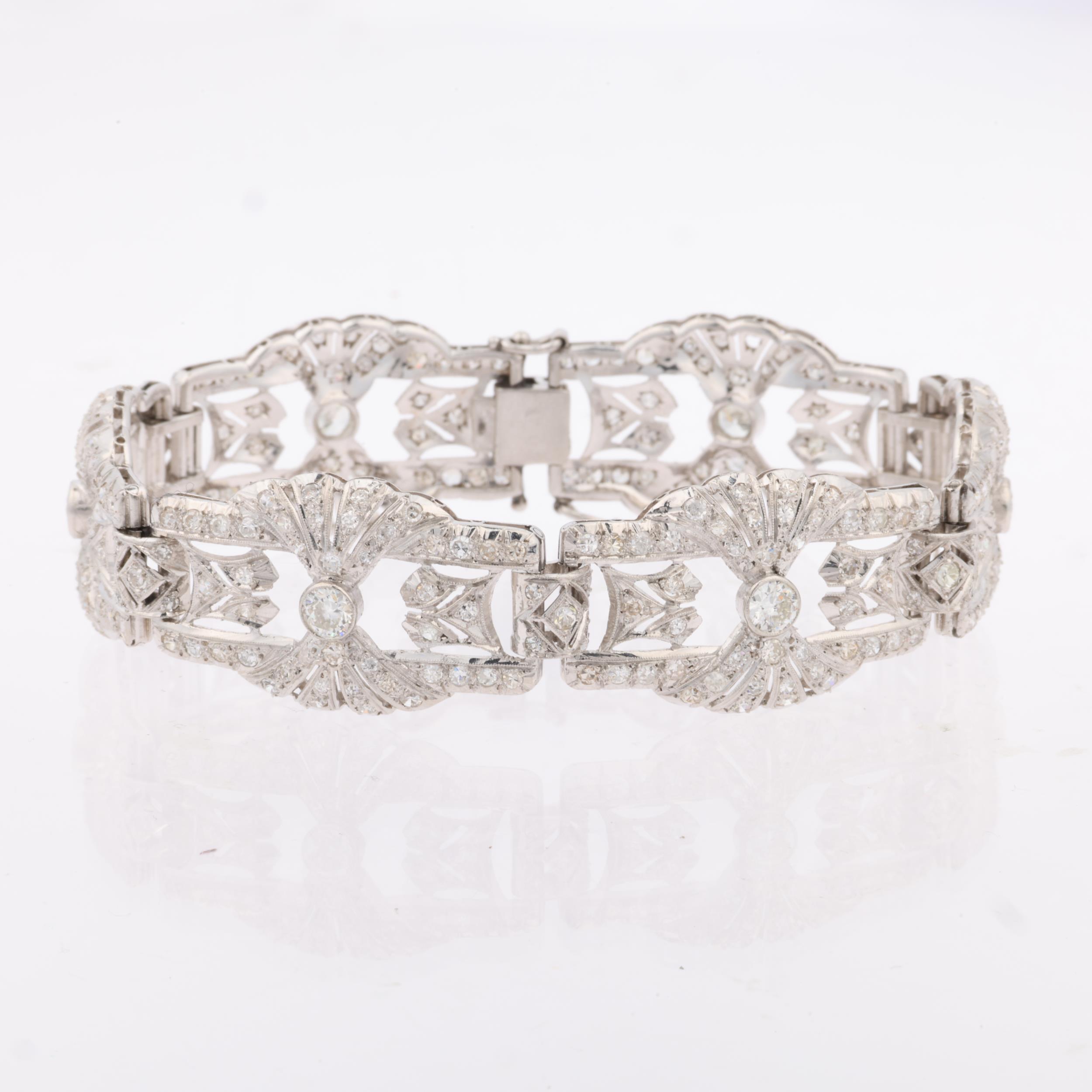 An Art Deco platinum and diamond panel bracelet, the 6 panels having openwork fan decoration and - Image 4 of 4