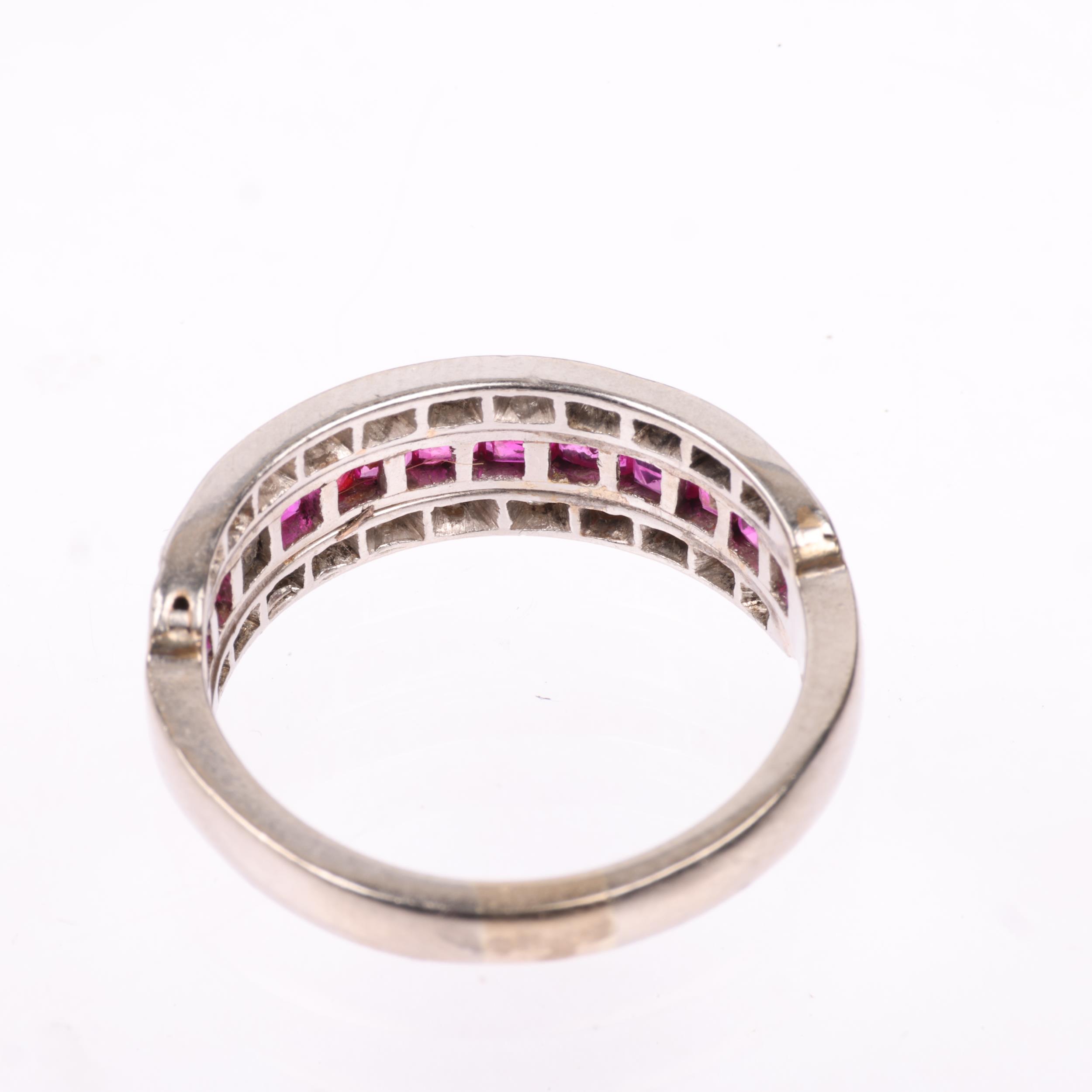 An Art Deco ruby and diamond triple row half eternity ring, circa 1925, channel and pave set with - Image 3 of 4