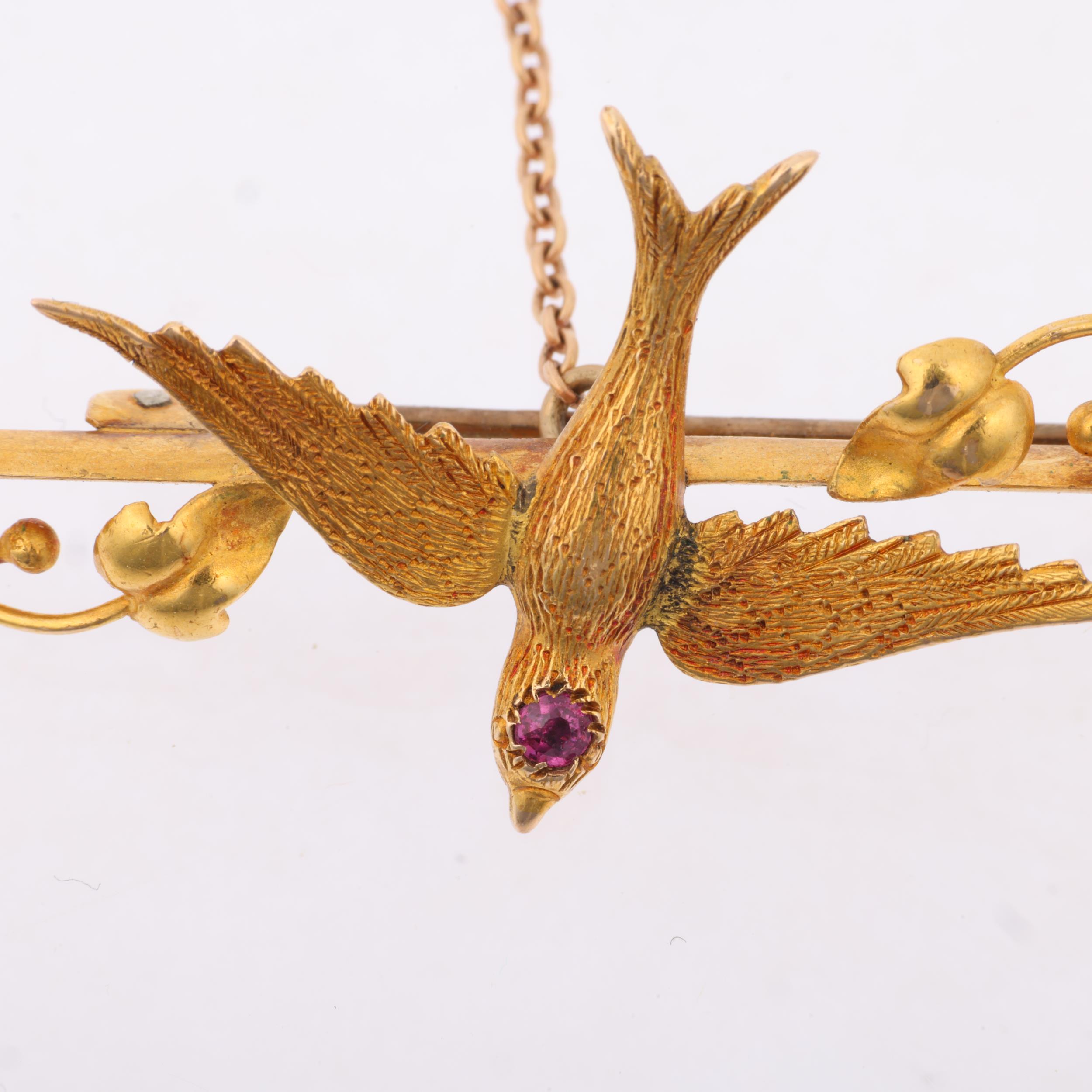 A Victorian 15ct gold ruby swallow bird bar brooch, 47mm, 4g Condition Report: No damage or - Image 2 of 4