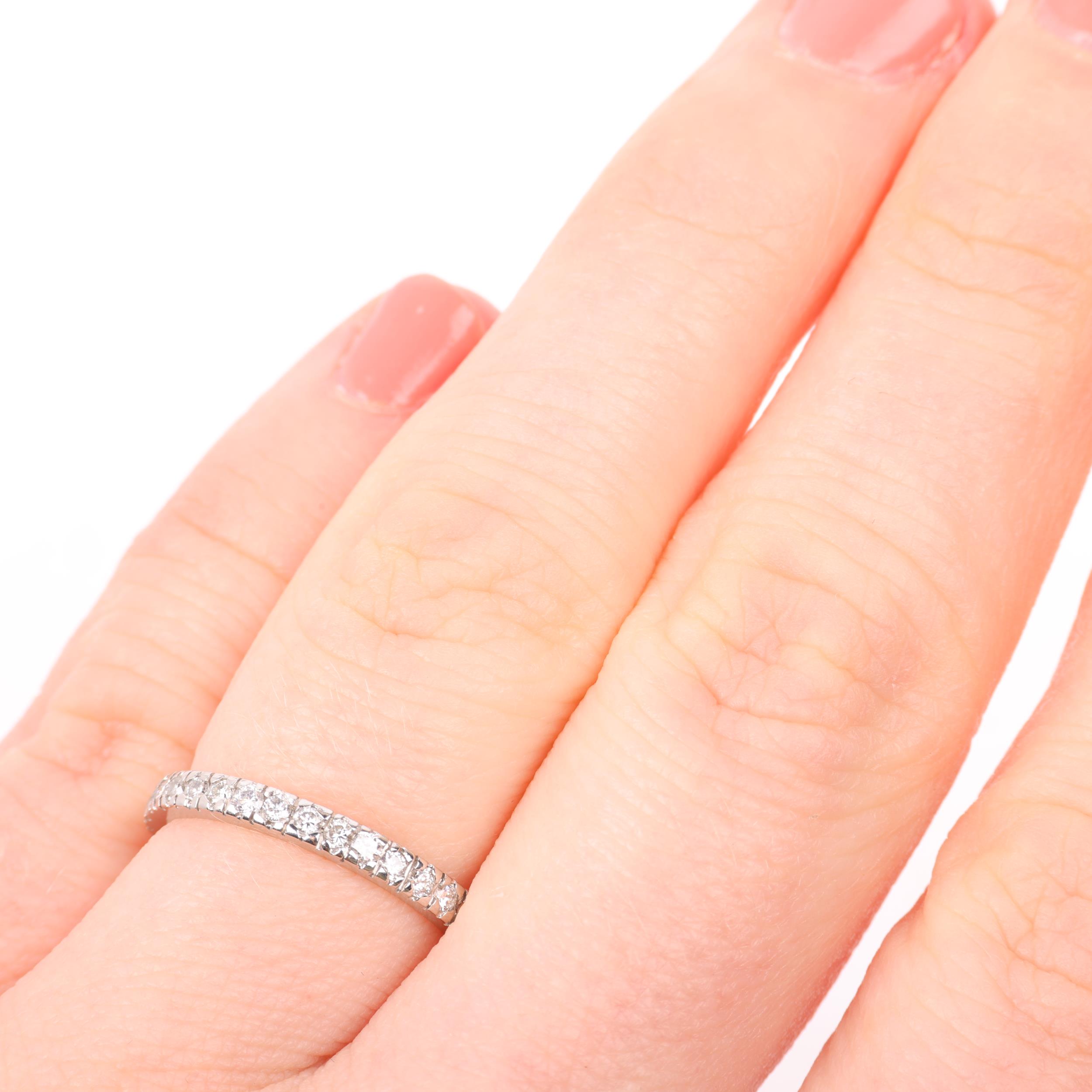 A modern platinum diamond full eternity ring, set with modern round brilliant-cut diamonds, total - Image 4 of 4