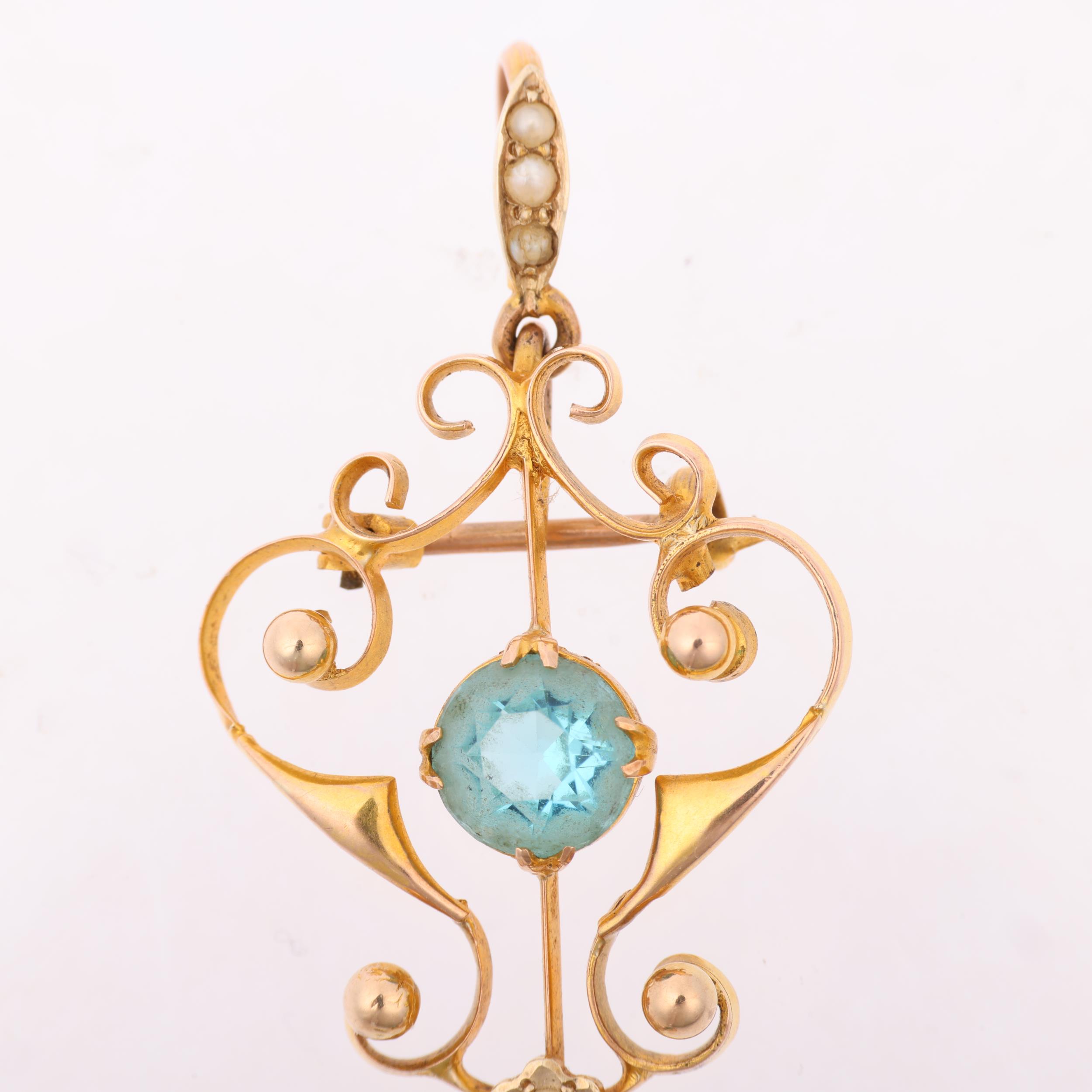 An Edwardian 9ct gold blue paste and pearl openwork pendant/brooch, 48.9mm, 3g Condition Report: - Image 2 of 4