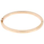 A 9ct gold plain hinged bangle, band width 4.1mm, internal circumference 18cm, 10.7g Condition