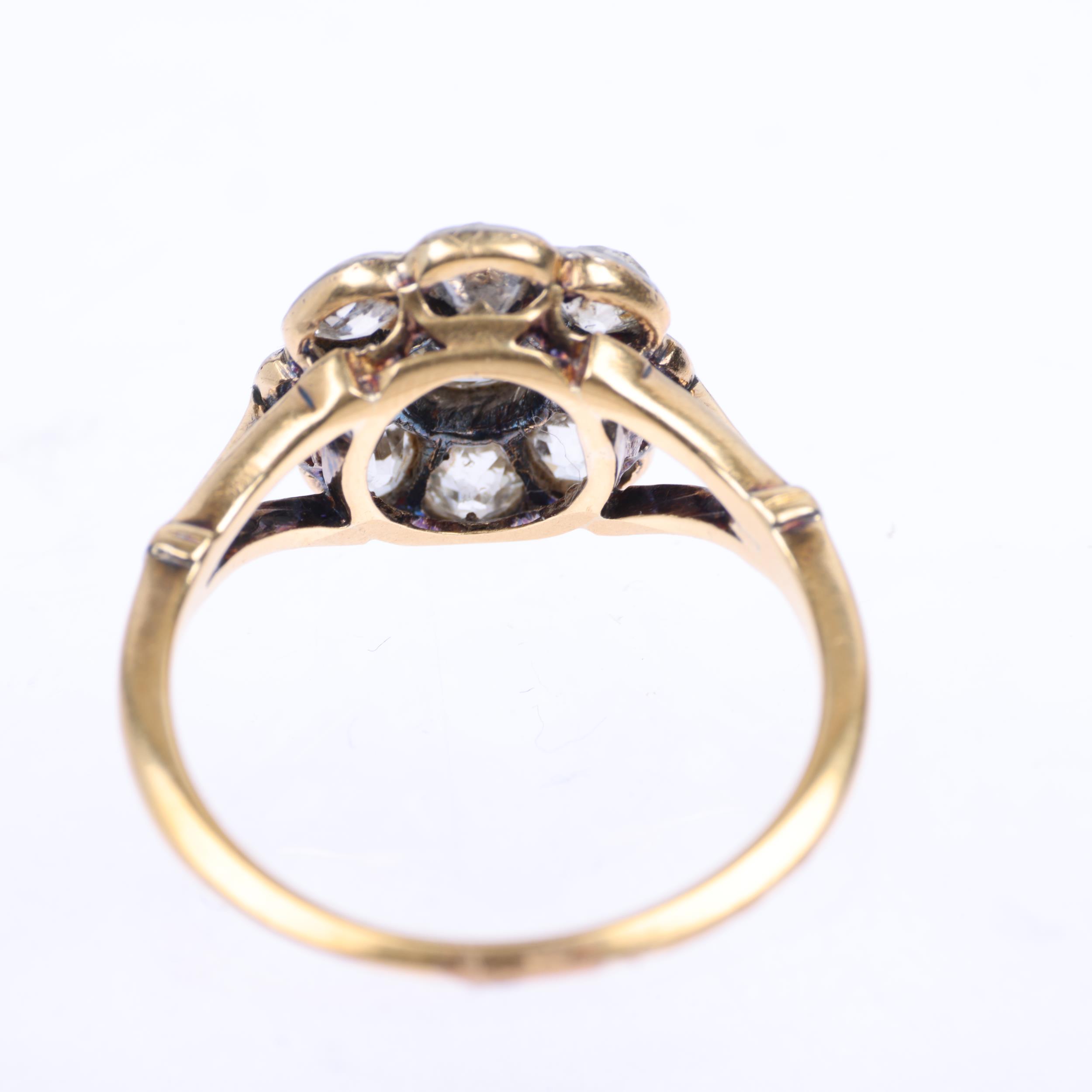 An 18ct gold diamond flowerhead cluster ring, rub-over set with old-cut diamonds, total diamond - Image 3 of 4