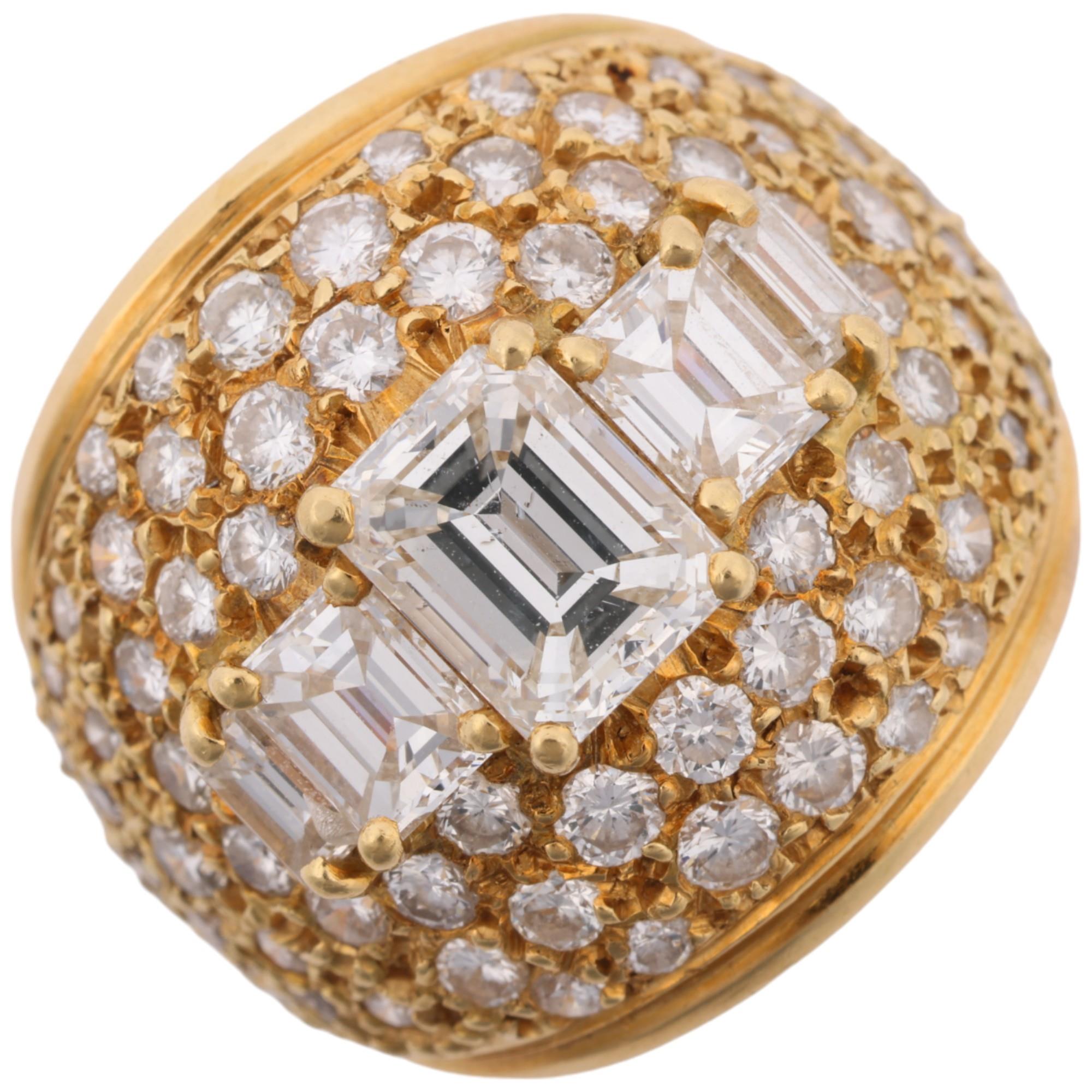 A Fine 18ct gold graduated five stone diamond bombe ring, London 2003, centrally claw set with