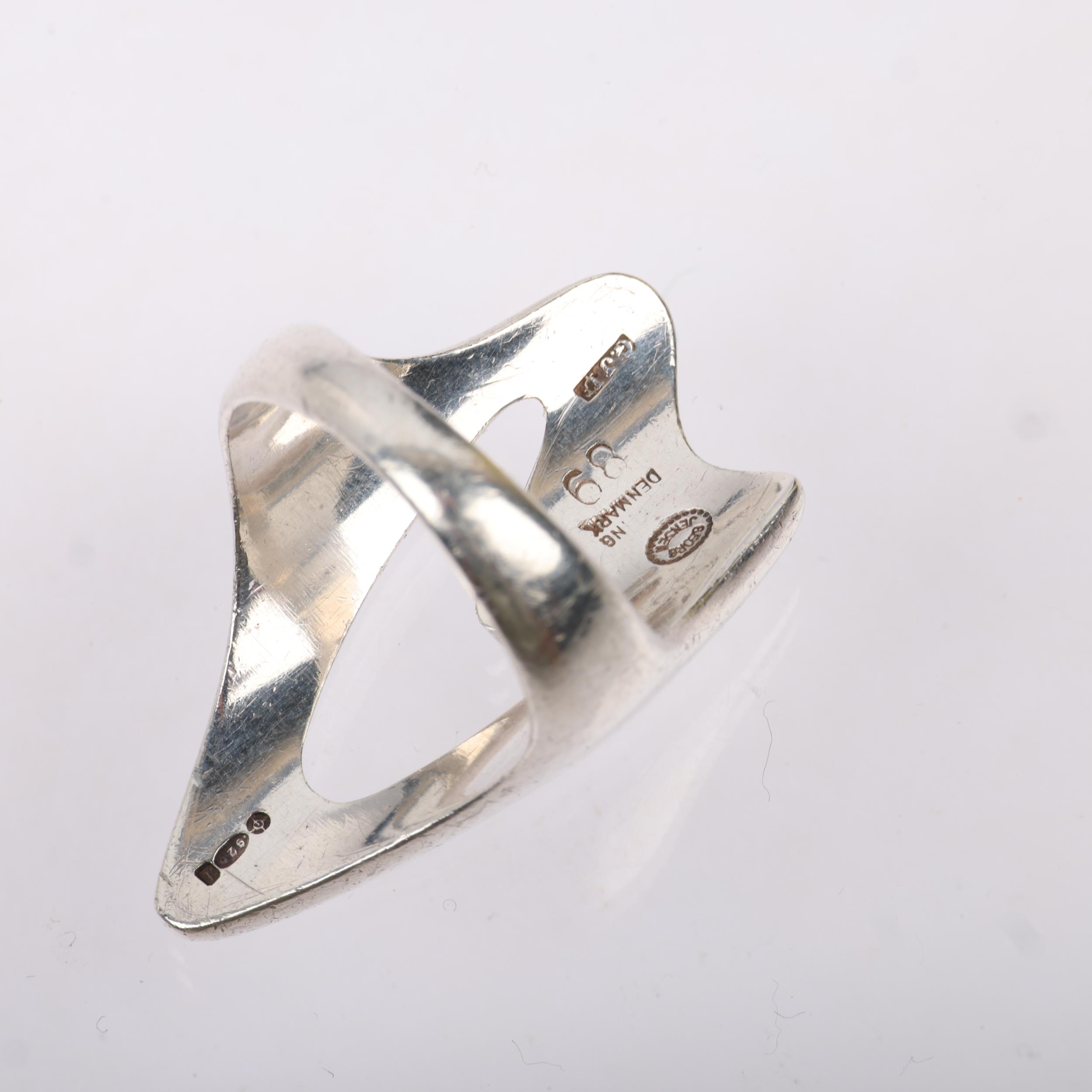 GEORG JENSEN - a Danish modernist sterling silver abstract openwork ring, designed by Henning - Image 2 of 3