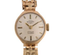 ROTARY - a lady's 9ct gold mechanical bracelet watch, silvered dial with applied gilt baton hour