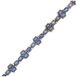 A modern 9ct gold sapphire tennis line bracelet, Birmingham 2005, set with oval mixed-cut sapphires,