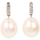 A pair of 9ct white gold whole pearl and diamond drop earrings, with stud fittings, 25.5mm, 6.5g