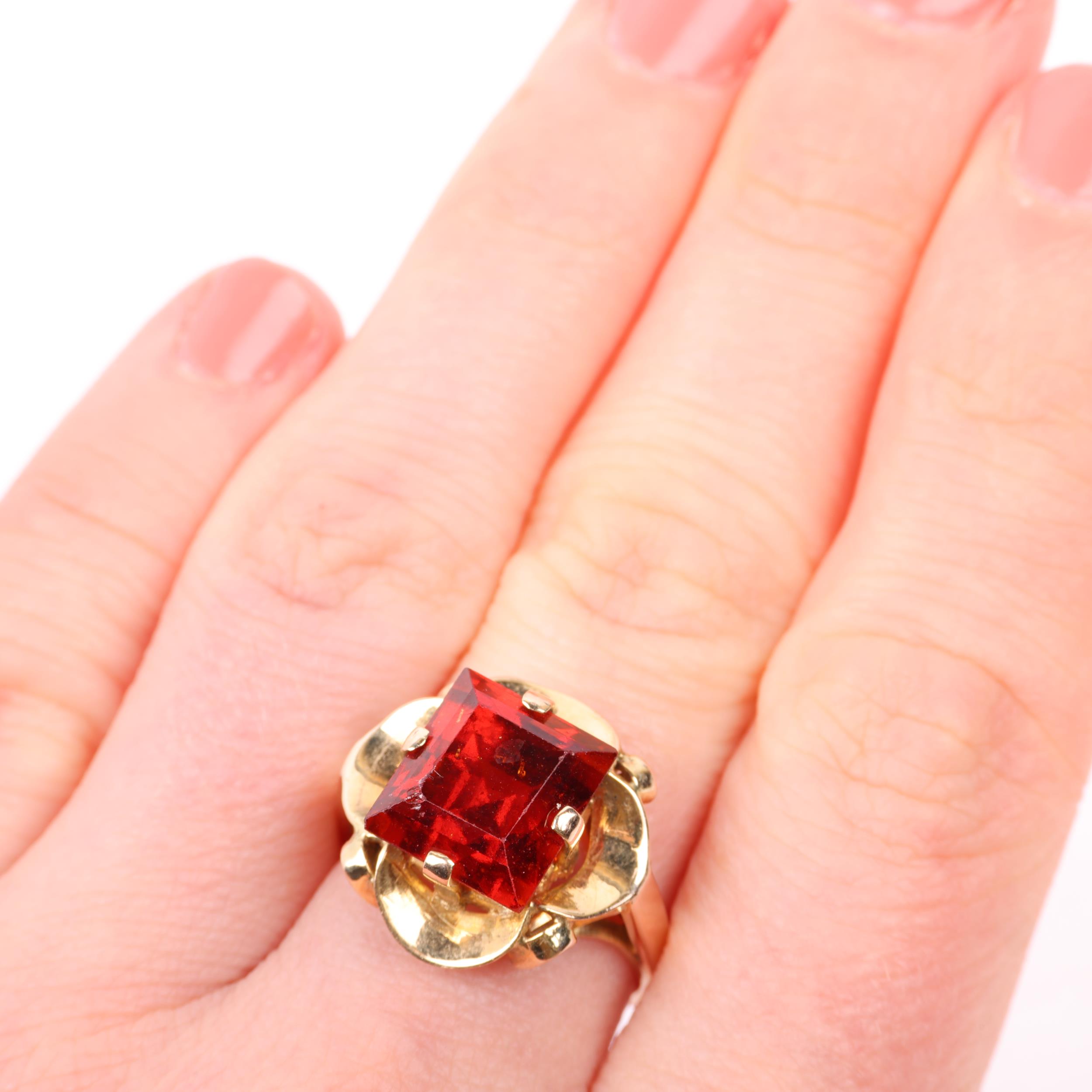 A late 20th century hessonite garnet dress ring, claw set with 9ct rectangular step-cut garnet, - Image 4 of 4