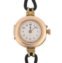 A lady's early 20th century 9ct gold mechanical wristwatch, circa 1916, silvered engine turned