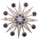 A large modern sapphire and diamond 8-ray starburst brooch, in the Victorian style, set with round-