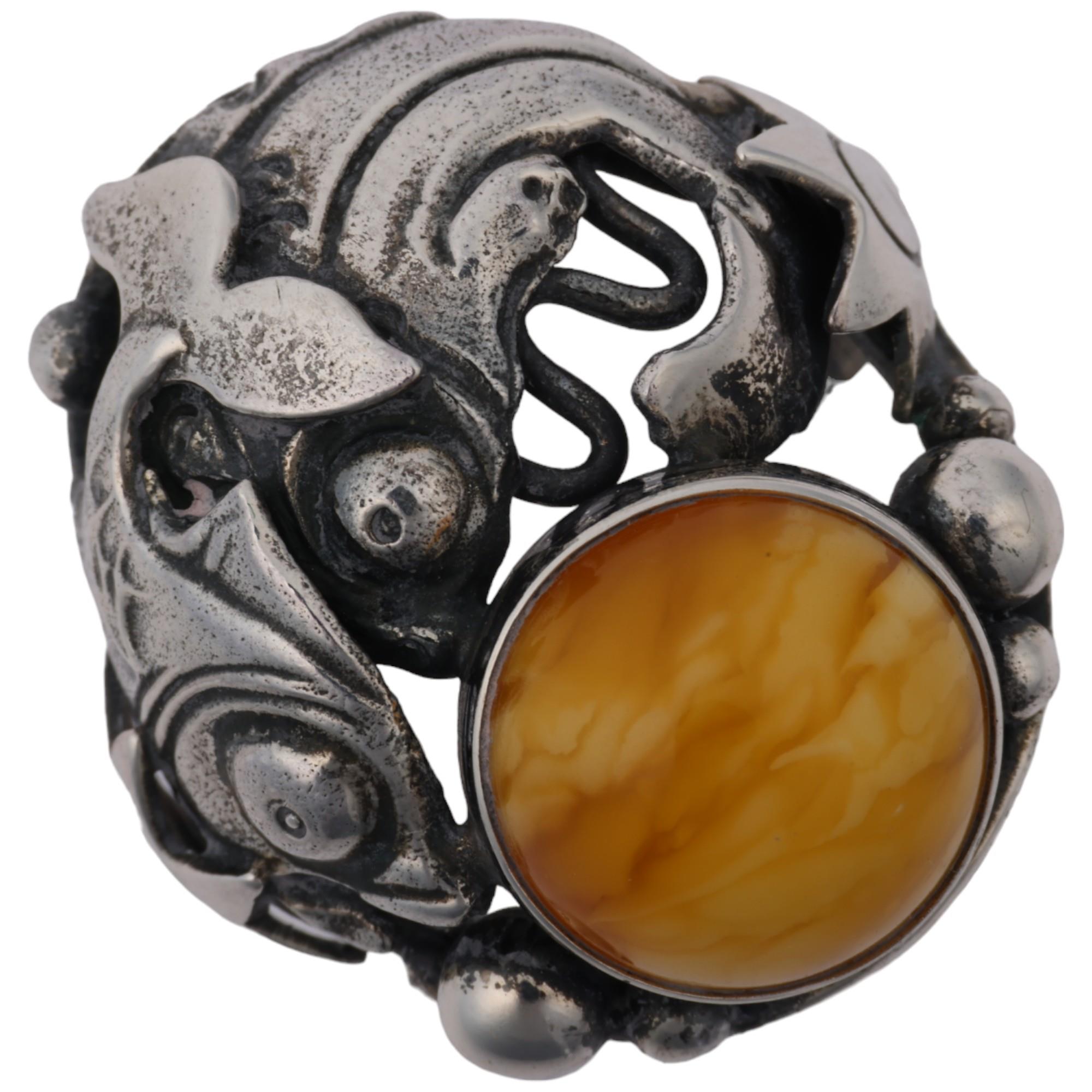 NIELS ERIK FROM - an Art Nouveau style Danish sterling silver and butterscotch amber fish openwork