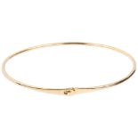 A Continental 18ct gold torque bangle, no maker's mark, band width 2.1mm, internal circumference