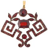 A Victorian Bohemian garnet geometric openwork pendant, 39.5mm, 4.7g Condition Report: Bale is a