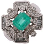 A large Continental 18ct white gold emerald and diamond cocktail ring, centrally claw set with 1.8ct