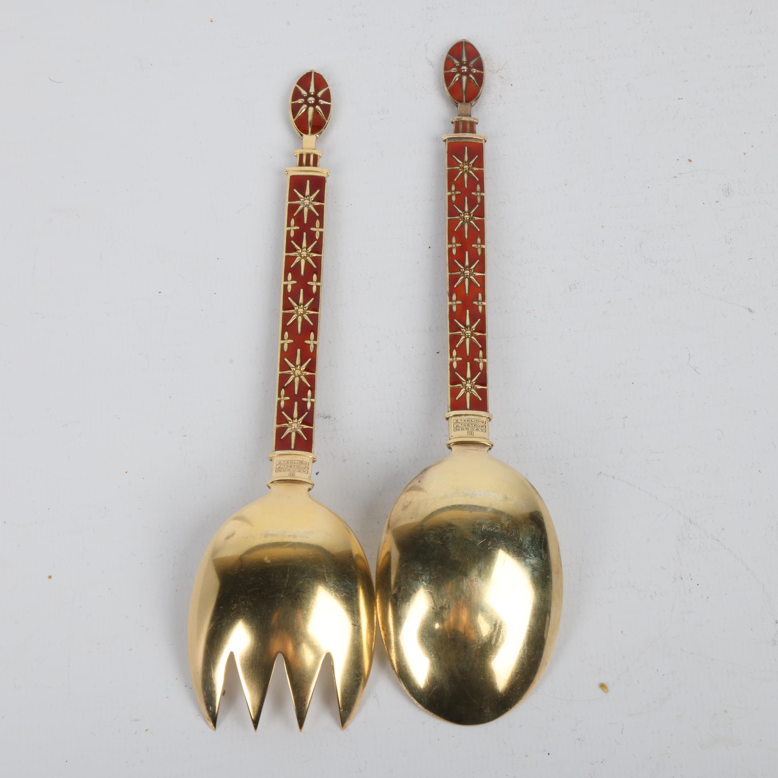 J TOSTRUP - a pair of Norwegian modernist sterling silver-gilt red enamel servers, Oslo circa - Image 2 of 3