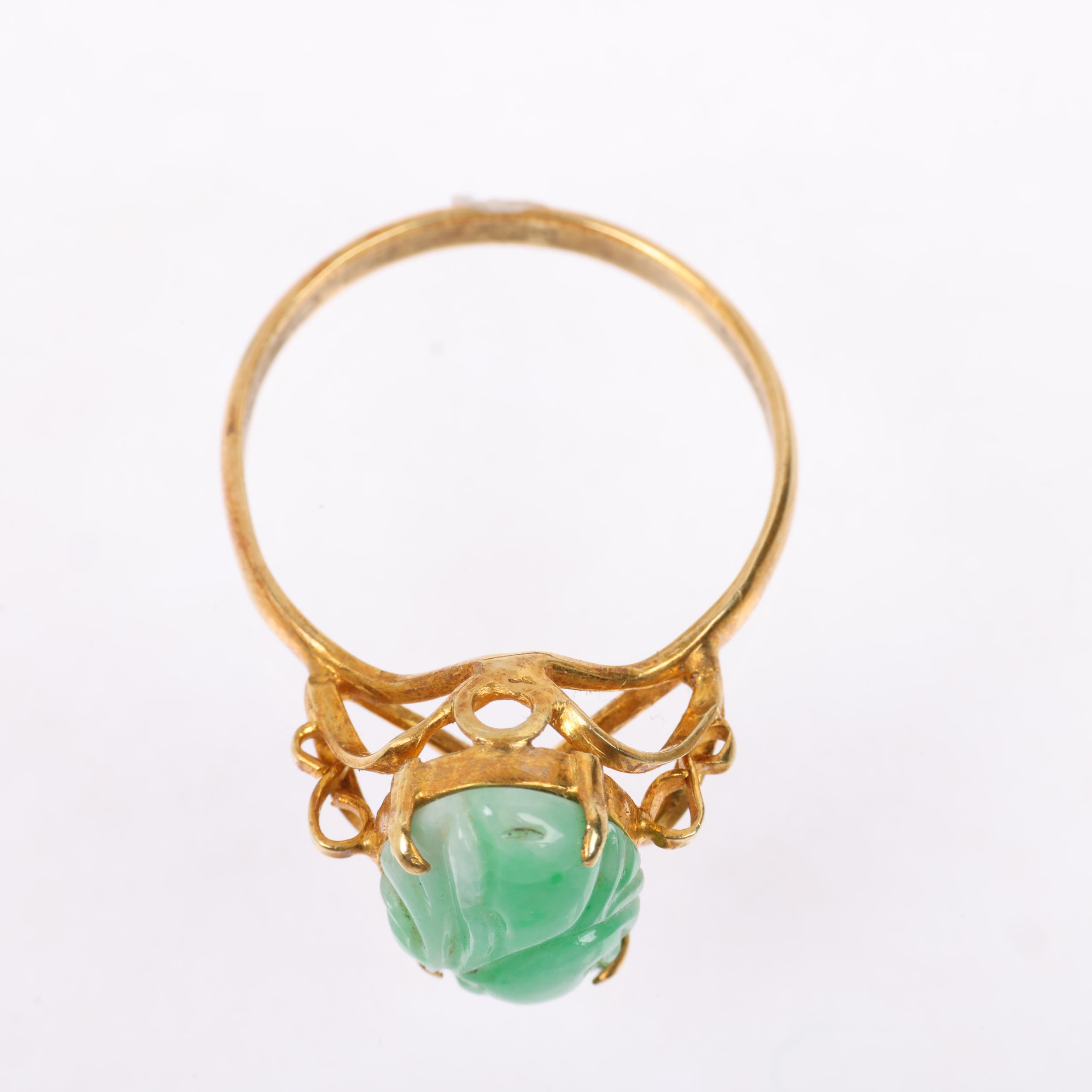 A Chinese 14ct gold carved jade panel ring, setting height 13.7mm, size T, 4.2g Condition Report: No - Image 3 of 4