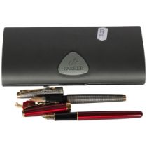 A sterling silver cased Parker fountain pen, and a Parker Sonnet Fountain pen (2)