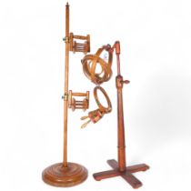 A fruitwood wool winder, and a tapestry adjustable stand with a selection of various frames