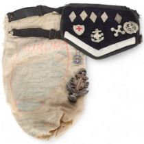 A collection of Vintage Boys Brigade pin badges, on a Brigade arm band, a Boys Brigade Coronation