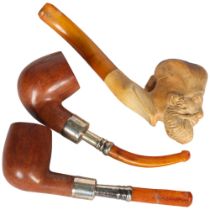 A cased pair of pipes with silver mounts, and a Meerschaum pipe