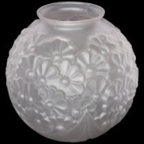 An Art Deco moulded glass vase with floral design, of globular form, H19.5cm