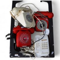 A group of 1970s and '80s rotary retro style landline telephones