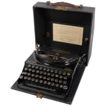 Vintage Remington Home Portable typewriter, dated 1951, in original case