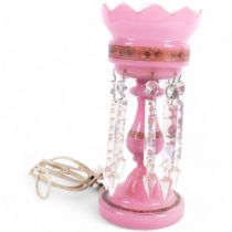 An Edwardian pink glass table lustre converted to an electric lamp, with arrowhead cut-glass